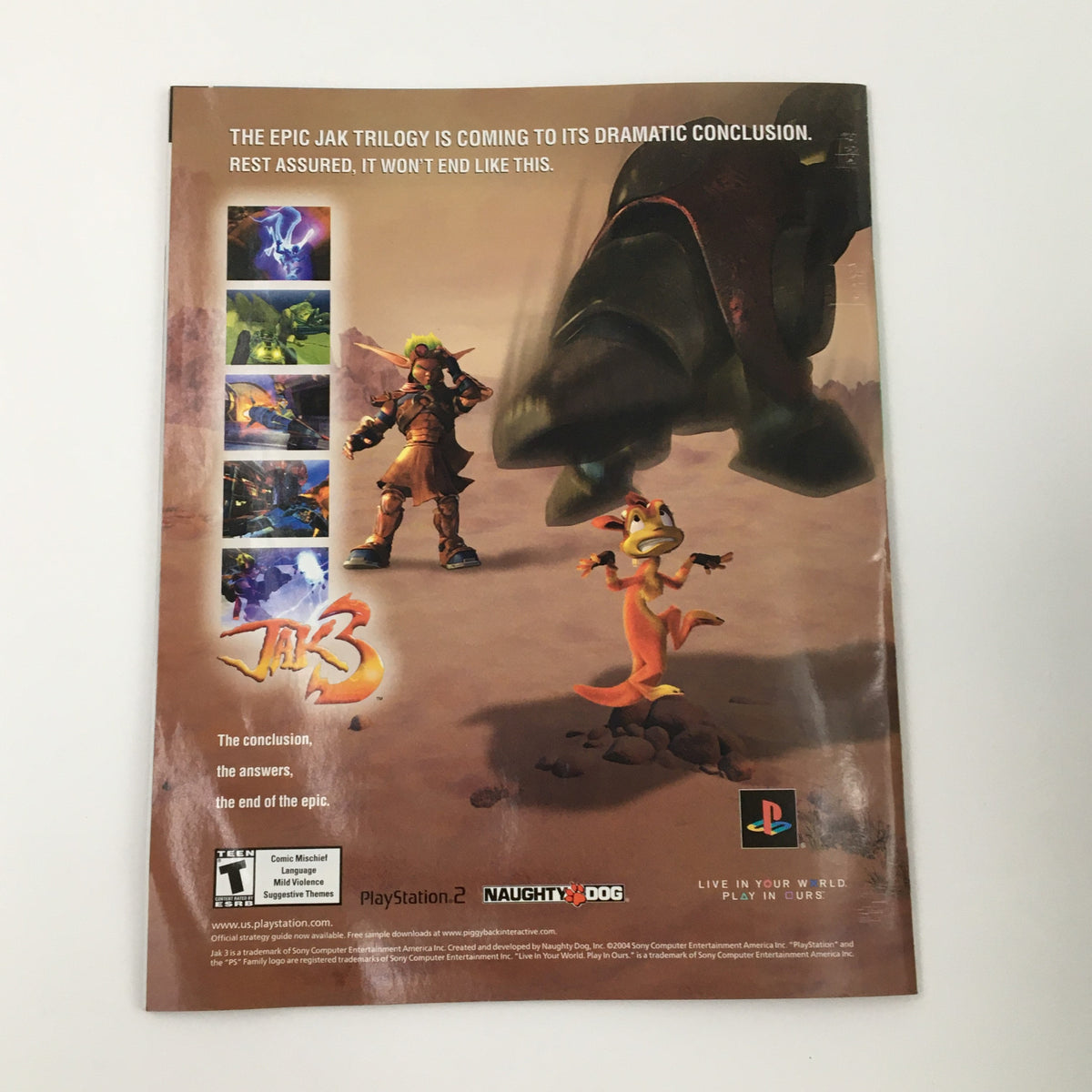 Back cover of the WWE Smack Down Holiday 2004 magazine, featuring an advertisement for the video game Jak 3 for PlayStation 2, promoting its dramatic conclusion.