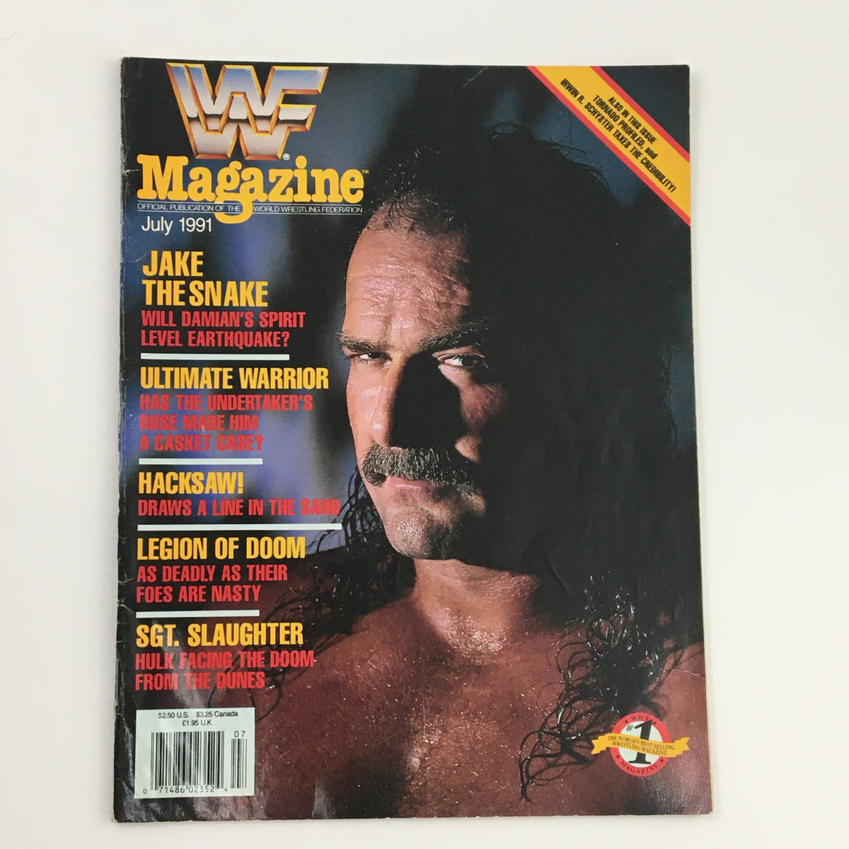 WWF Wrestling Magazine July 1991 cover featuring Jake The Snake and Ultimate Warrior, showcasing the excitement of professional wrestling with vibrant graphics.