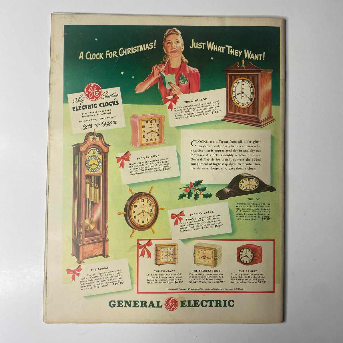 Advertisement from Look Magazine December 16, 1941 for General Electric clocks, featuring stylish designs in a festive layout appealing to holiday shoppers.