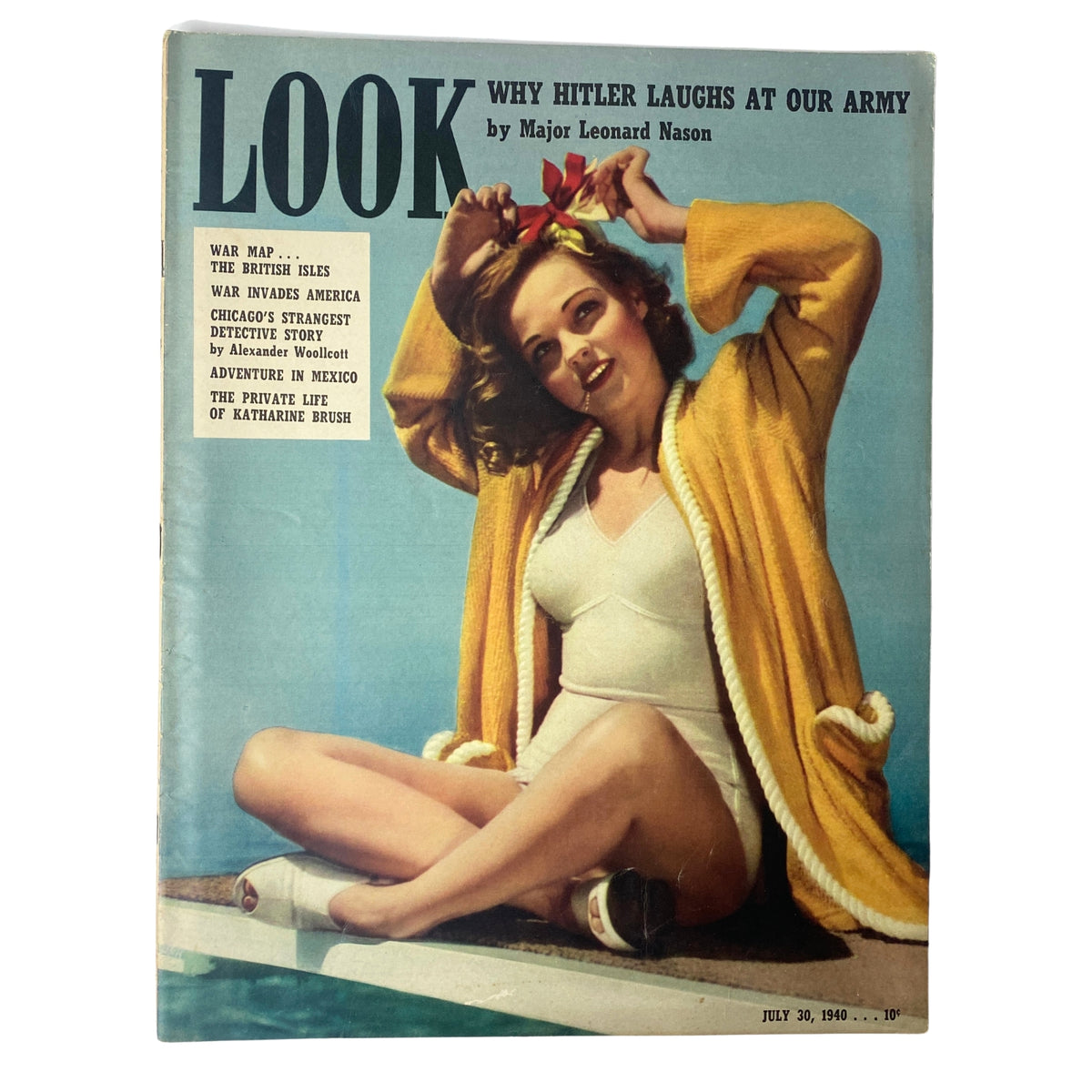 Cover of Look Magazine dated July 30, 1940, featuring the headline 'Why Hitler Laughs at Our Army' by Major Leonard Nason, showcasing a glamorous actress resembling Paulette Goddard.