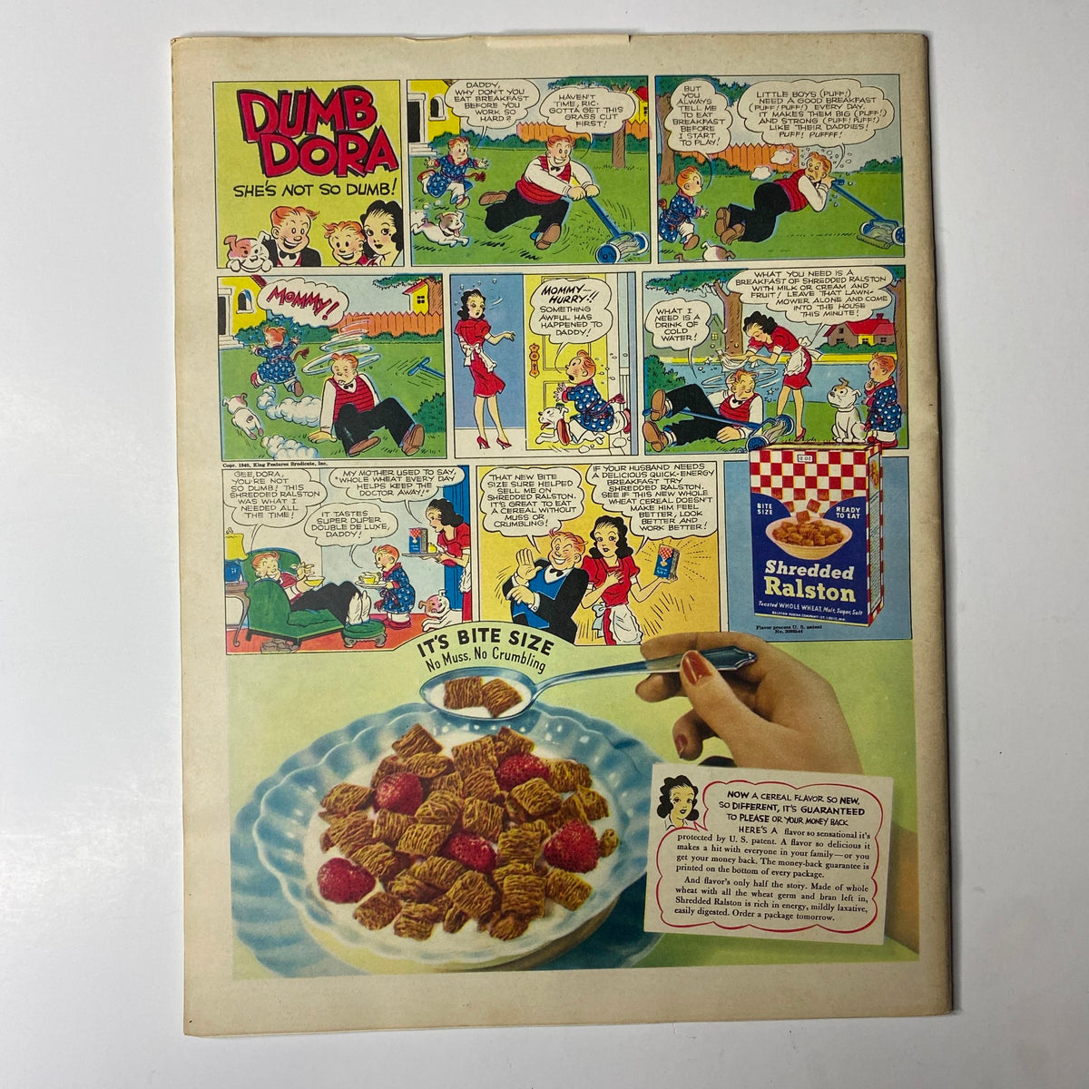 Back cover of Look Magazine, May 21, 1940, featuring a comic strip titled 'Dumb Dora' with playful illustrations.
