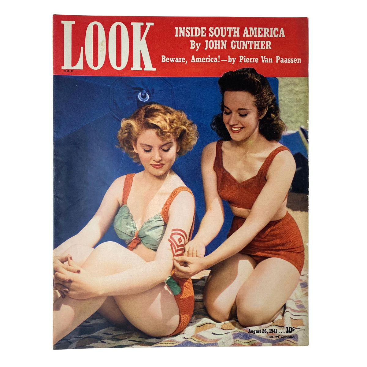 Cover of Look Magazine from August 26, 1941 featuring actresses Peggy Moran and Elaine Morey in vintage swimsuits, highlighting the theme of ‘Inside South America’.