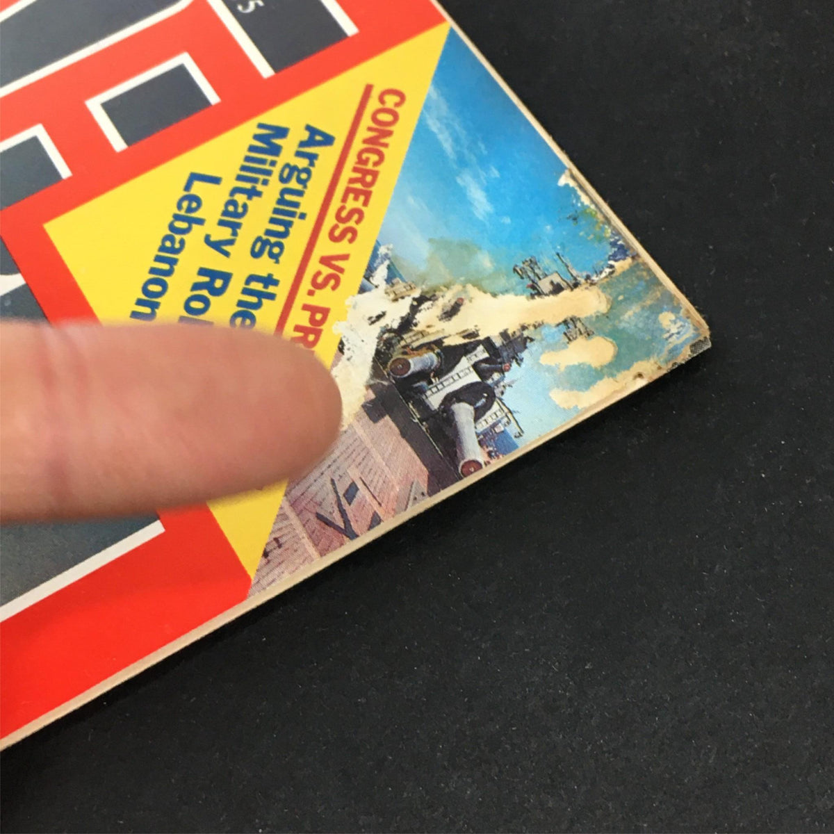 Close-up of the corner of a vintage Time Magazine from September 25, 1983, showing wear and a promotional sticker labeled 'Congress vs. President'.