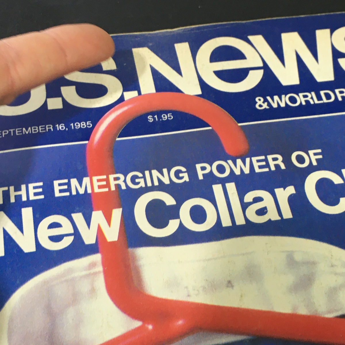 Close-up of the cover of VTG US News & World Report Magazine September 16 1985 highlighting the title 'The Emerging Power of the New Collar Class' and an illustration of a red hanger.