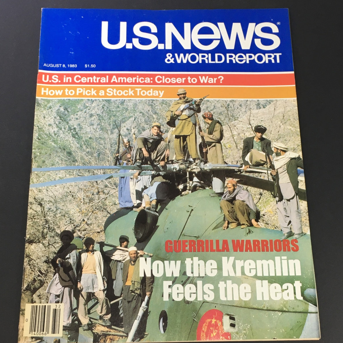 U.S. News & World Report magazine cover from August 8, 1983, featuring the headline 'Guerrilla Warriors' and a photograph of guerrilla fighters on a helicopter, highlighting significant historical events.