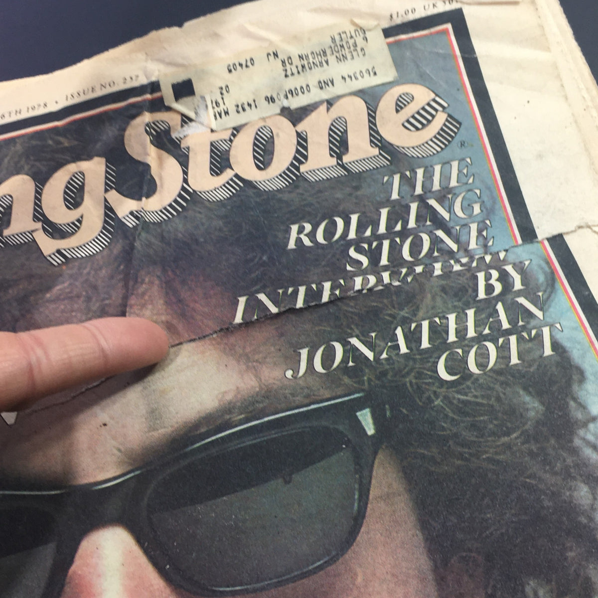 Close-up of the cover of Vintage Rolling Stone Magazine from January 26, 1978, showing the title and the feature on Bob Dylan, along with an interview by Jonathan Cott.