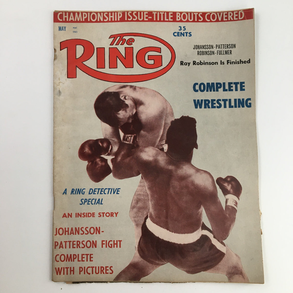 Cover of The Ring Boxing Magazine May 1961, featuring the Johansson vs Patterson fight, with a prominent title and visual elements related to boxing.