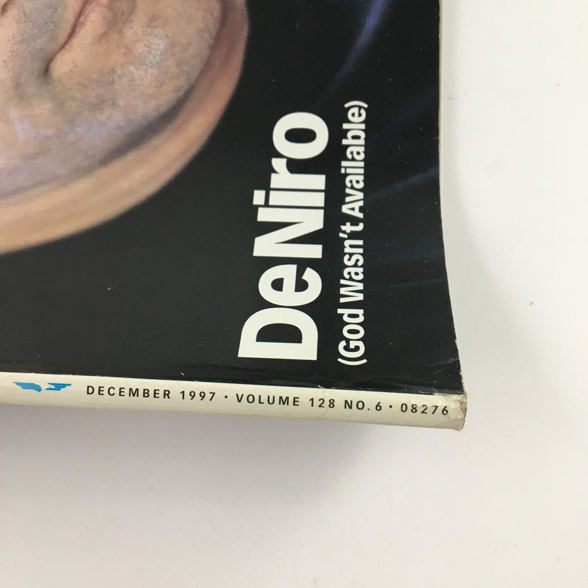 Spine detail of Esquire Magazine December 1997 with title DeNiro (God Wasn't Available) and publication info.