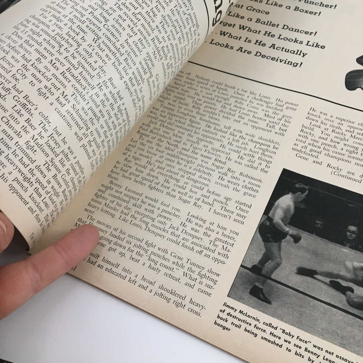 Interior view of The Ring Boxing Magazine July 1961 with pages open, highlighting boxing articles and imagery from the historical boxing scene.