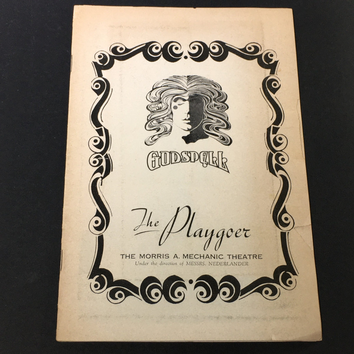 Cover of VTG The Playgoer December 1973 featuring Godspell Musical by Nina Faso, showcasing artistic graphics and presentation.
