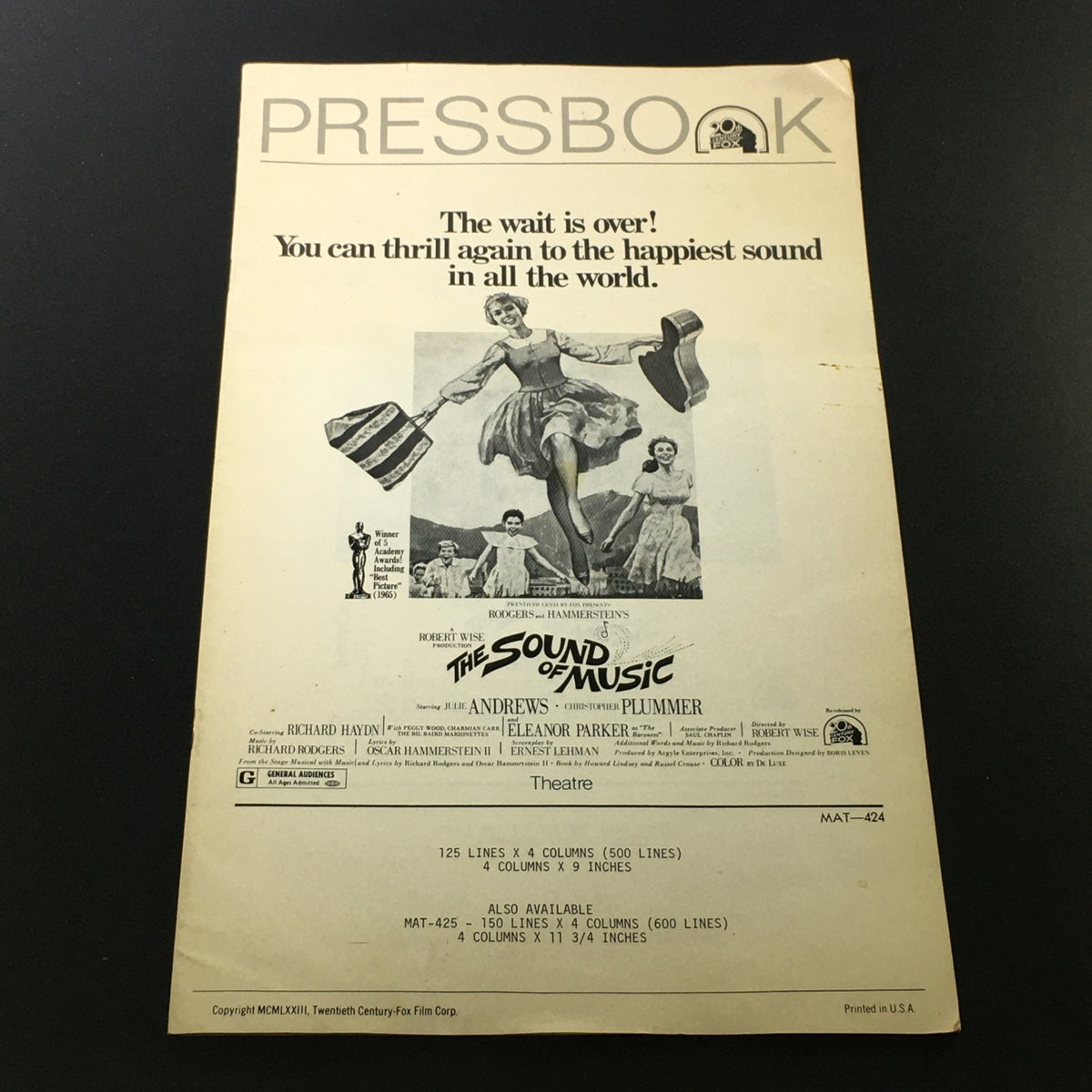 Vintage pressbook for 'The Sound of Music' featuring Julie Andrews and Christopher Plummer. The front cover highlights a scene from the film with promotional text.