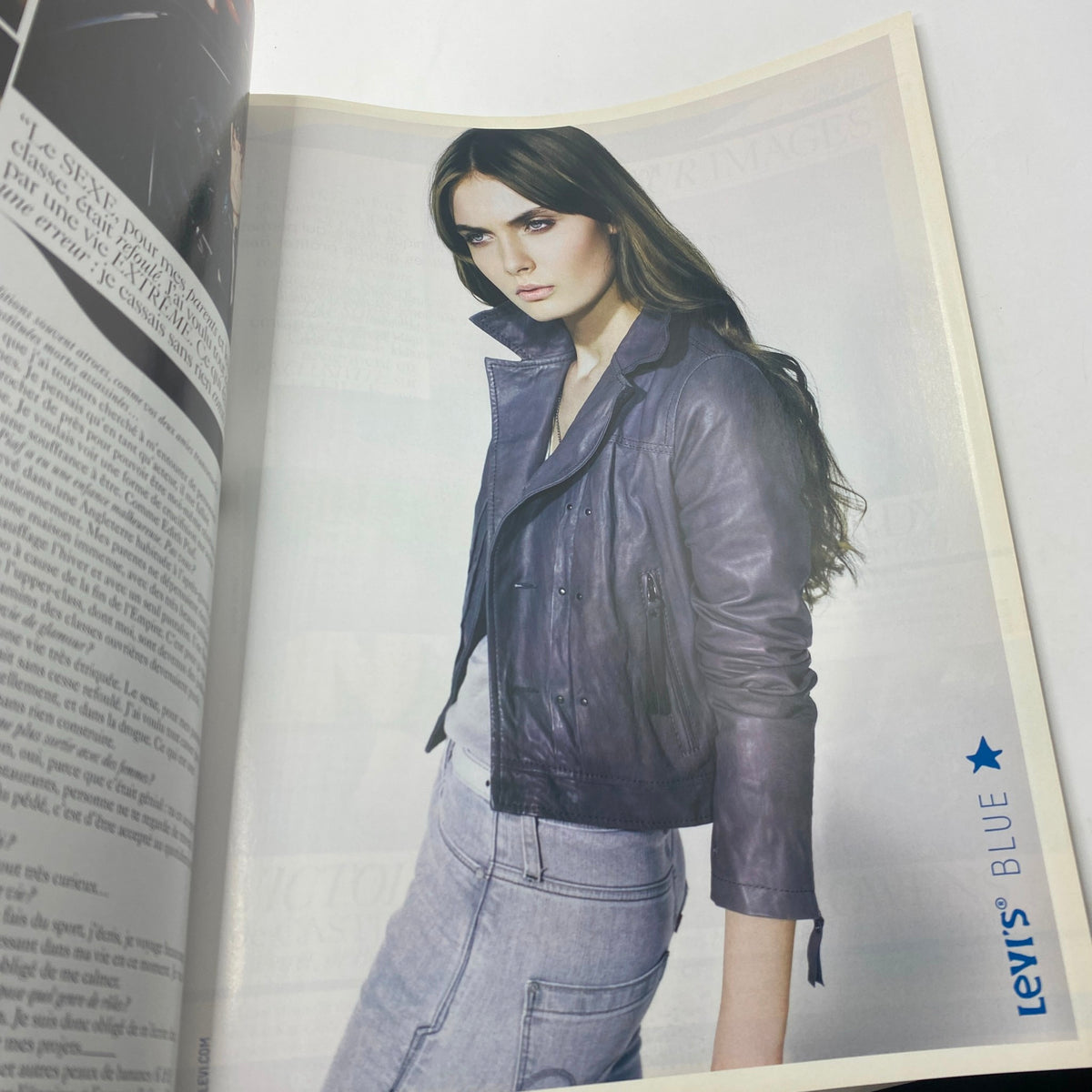 Another interior page of Vogue Paris Magazine May 2008 featuring a model in stylish attire and modern fashion photography.
