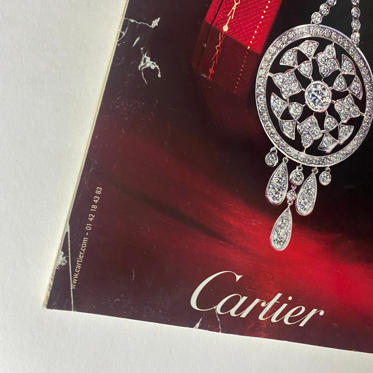 Close-up view of the Cartier jewelry advertisement from Vogue Paris Magazine May 2008 featuring an exquisite diamond necklace design.