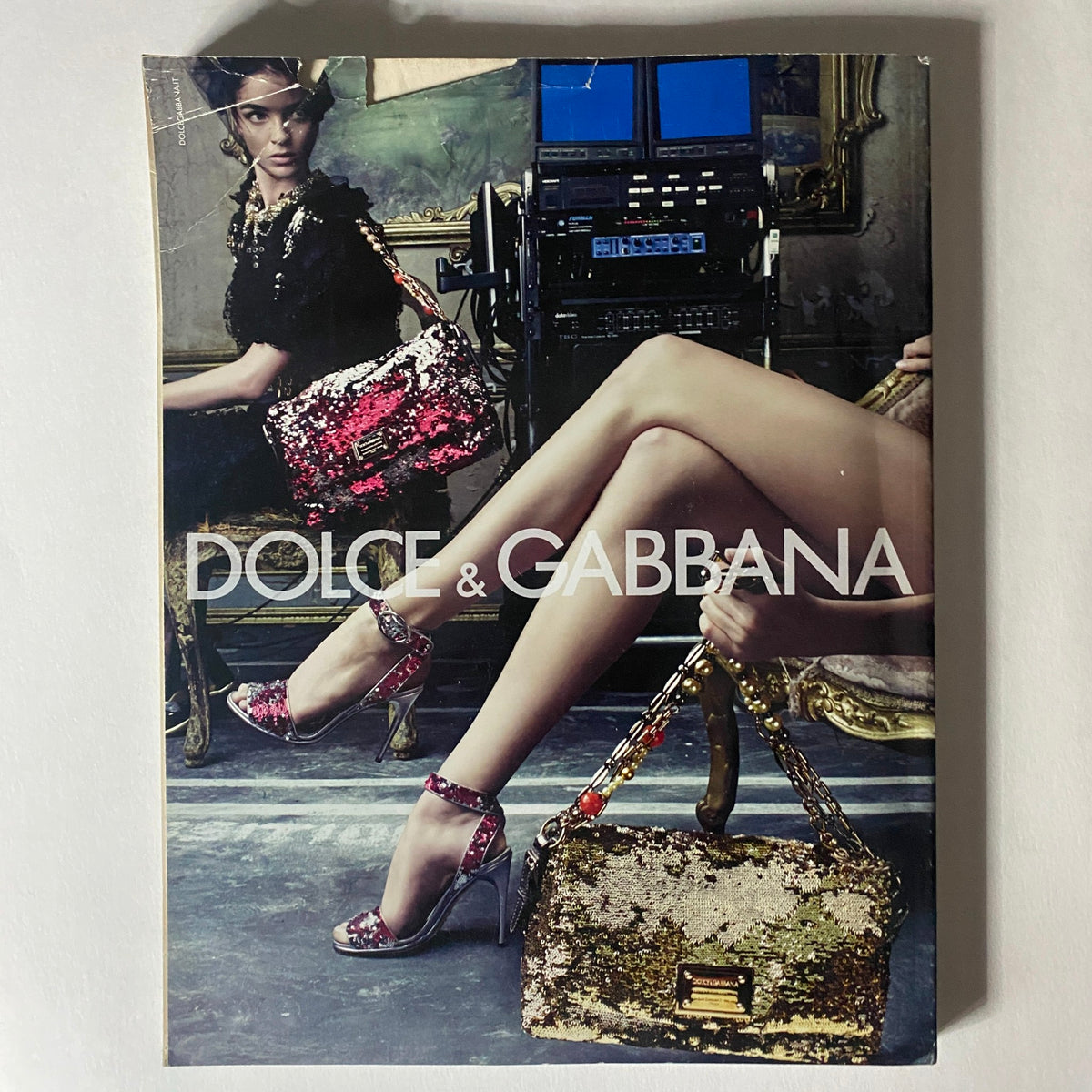 Cover of Dolce & Gabbana advertisement featured in Numéro Magazine March 2009, highlighting luxury fashion accessories.