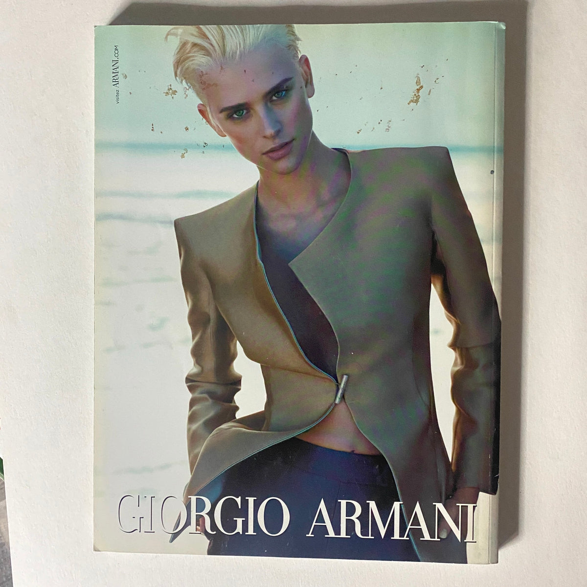Cover page of Giorgio Armani feature in Numéro Magazine February 2012 No. 130, showcasing modern elegance in fashion design.
