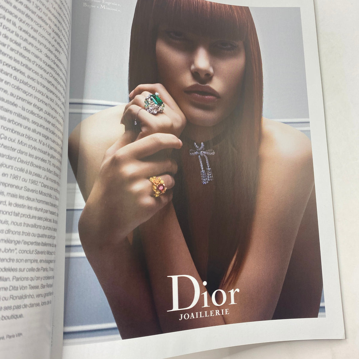 Interior page from Numéro Magazine December 2009 No. 109 displaying a Dior Joaillerie advertisement with a model wearing luxurious rings and showcasing high-end jewelry.