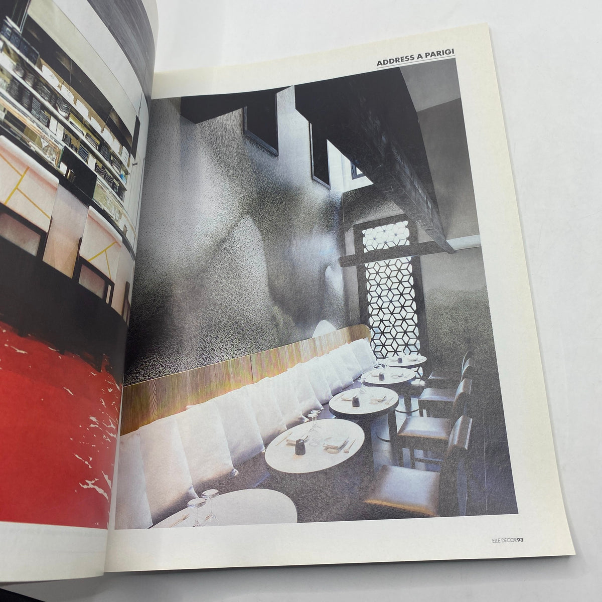 Interior view from Elle Decor Italia Magazine March 2013 Urban Style showcasing a stylish dining area with elegant furniture and artistic decor.