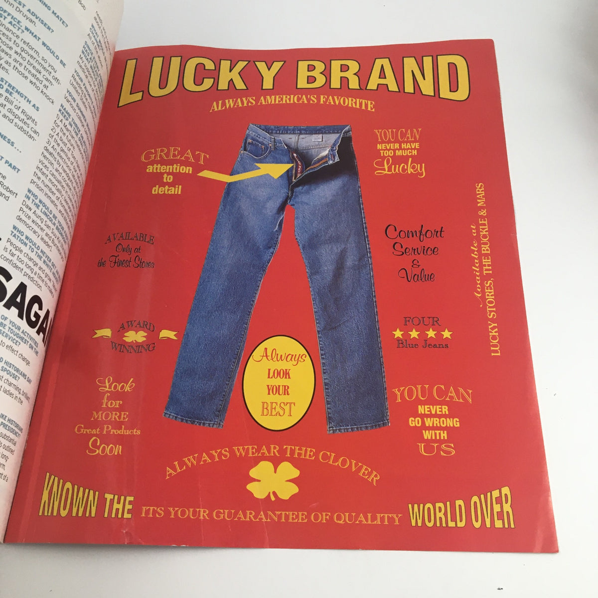 An advertisement page from the February 1997 issue of George Magazine, promoting Lucky Brand jeans. The page highlights the brand's comfort and detail, reflecting the fashion trends of the 1990s.