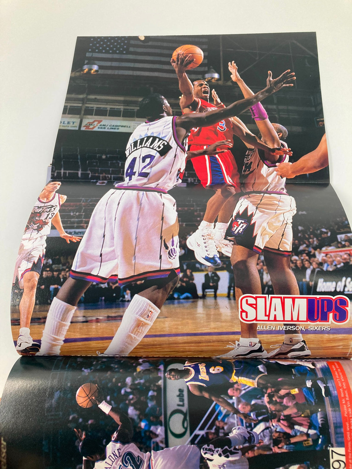 Fold-out poster from Slam Magazine September 1997 showcasing Allen Iverson during a game, emphasizing the exciting visuals of basketball's golden era and its impact on sports culture.