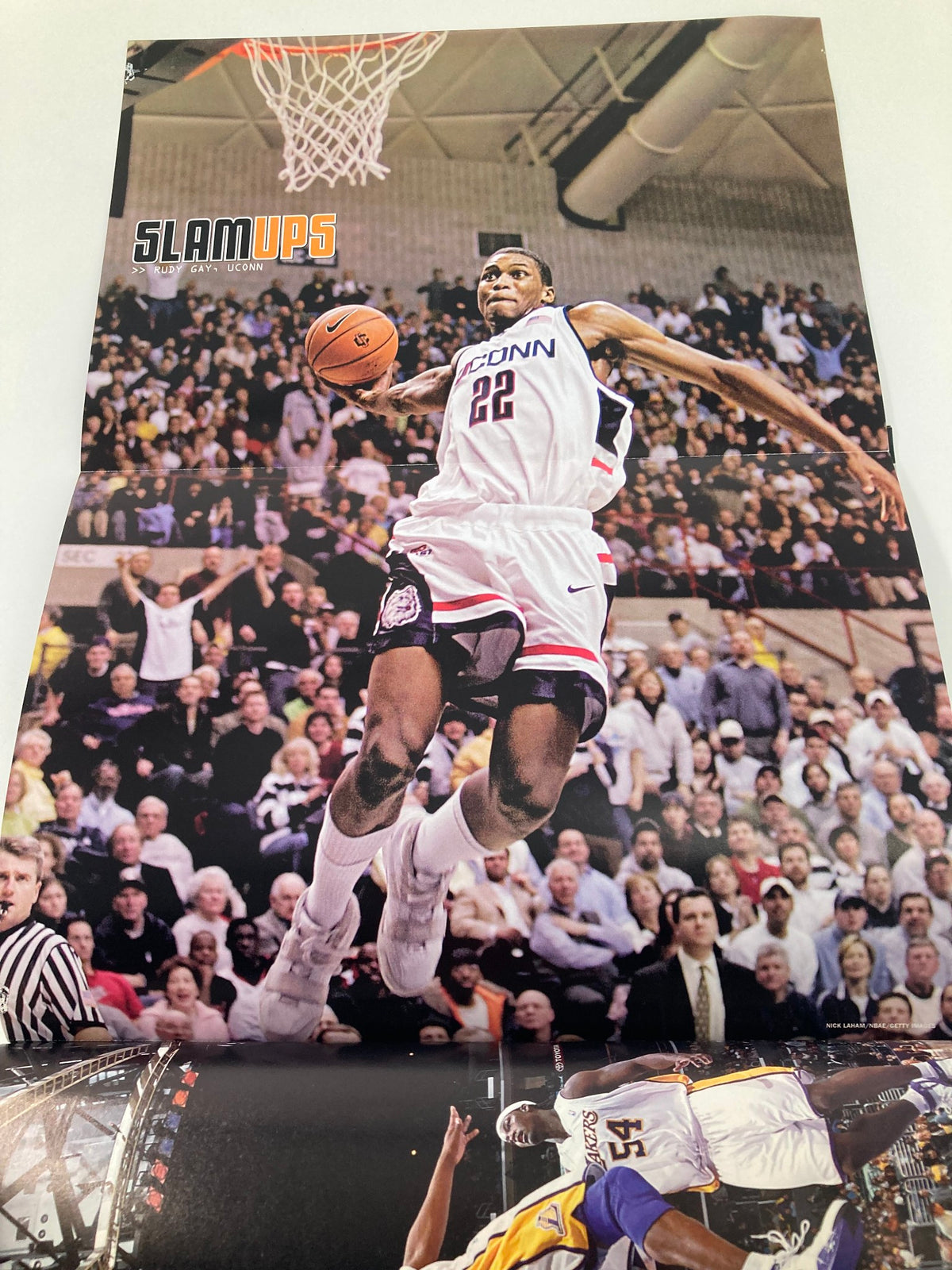 Poster included in Slam Magazine May 2006 displaying a dynamic basketball dunk by a player wearing 22.