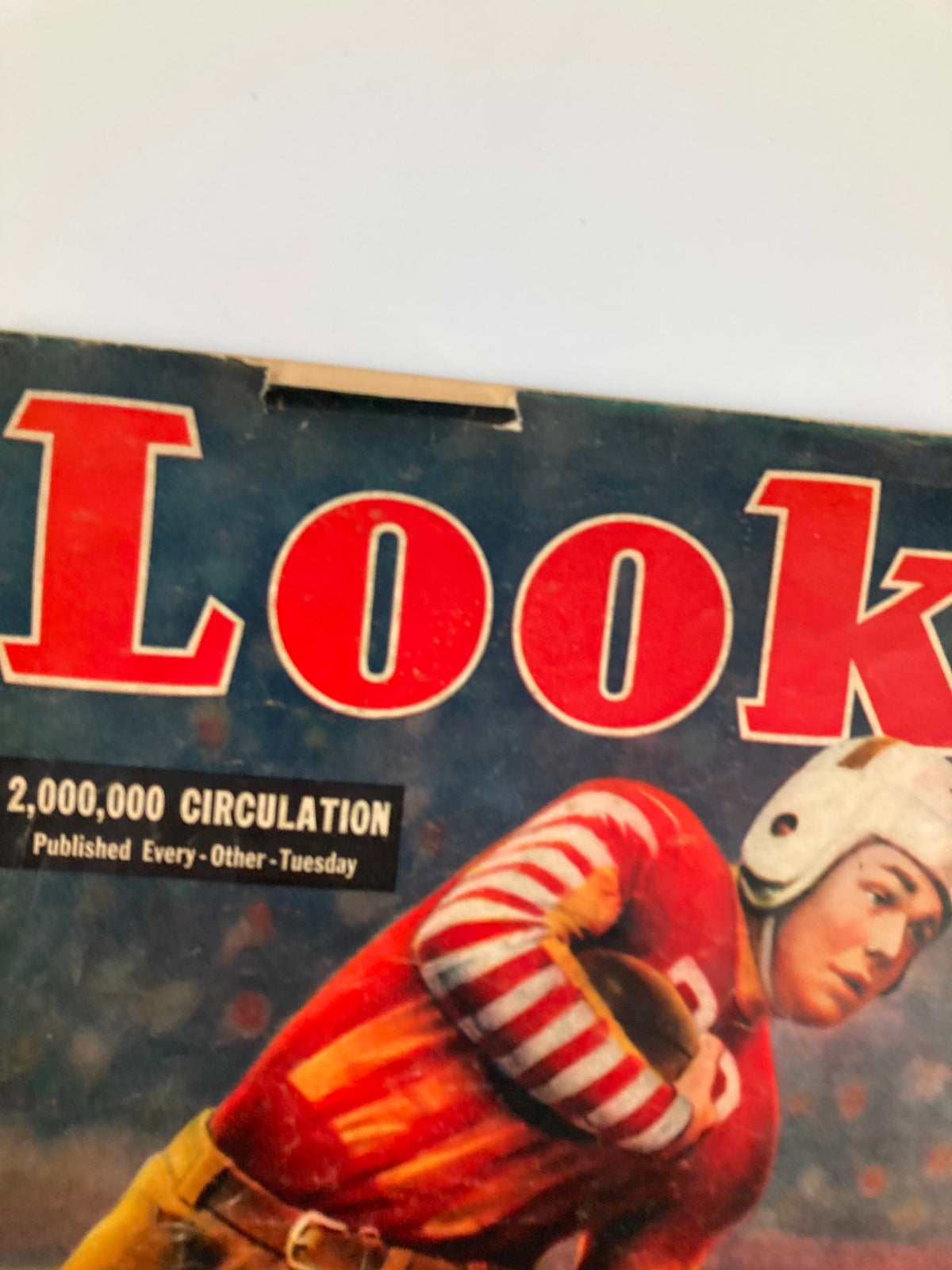 Cover of VTG Look Magazine from October 26, 1937, featuring a colorful illustration of a football player in a striped jersey, highlighting the publication's 2,000,000 circulation.