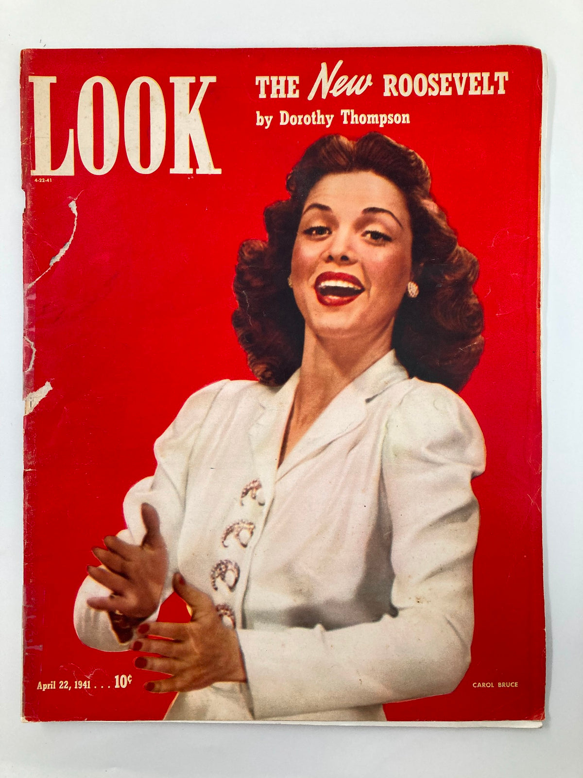 Cover of VTG Look Magazine from April 22, 1941 featuring Carol Bruce, a musical comedy star, showcasing vibrant red background and vintage style.