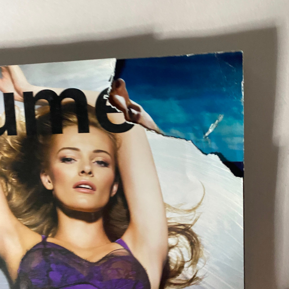 Close-up of the cover of Numéro Magazine March 2010 No. 111, highlighting Edita Vilkevičiūtė and intricate fashion details.