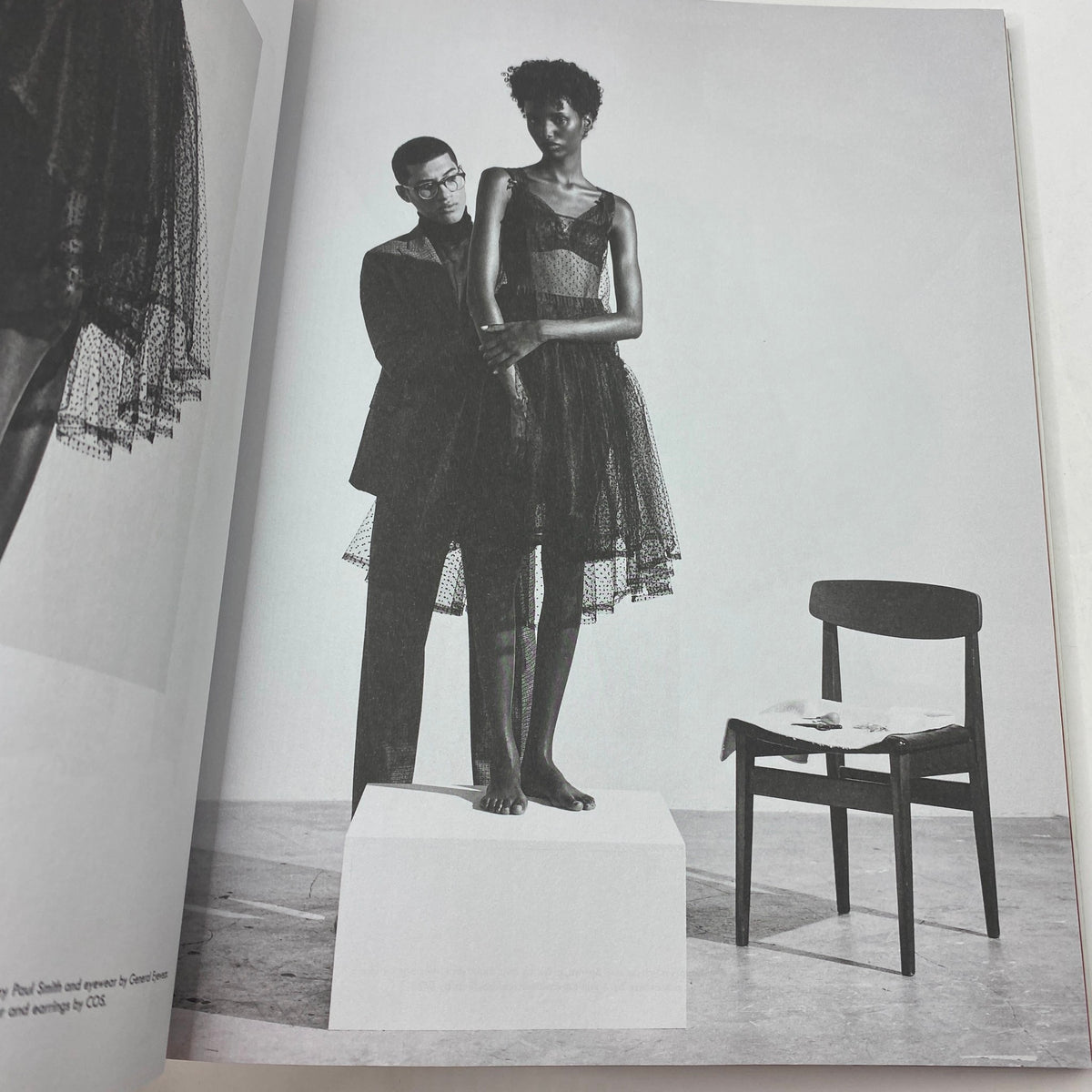 Kinfolk 30 Book by Kinfolk Magazine Winter 2018 - Artistic black and white photograph featuring a model in a dress with a stylist at a minimalistic gallery.