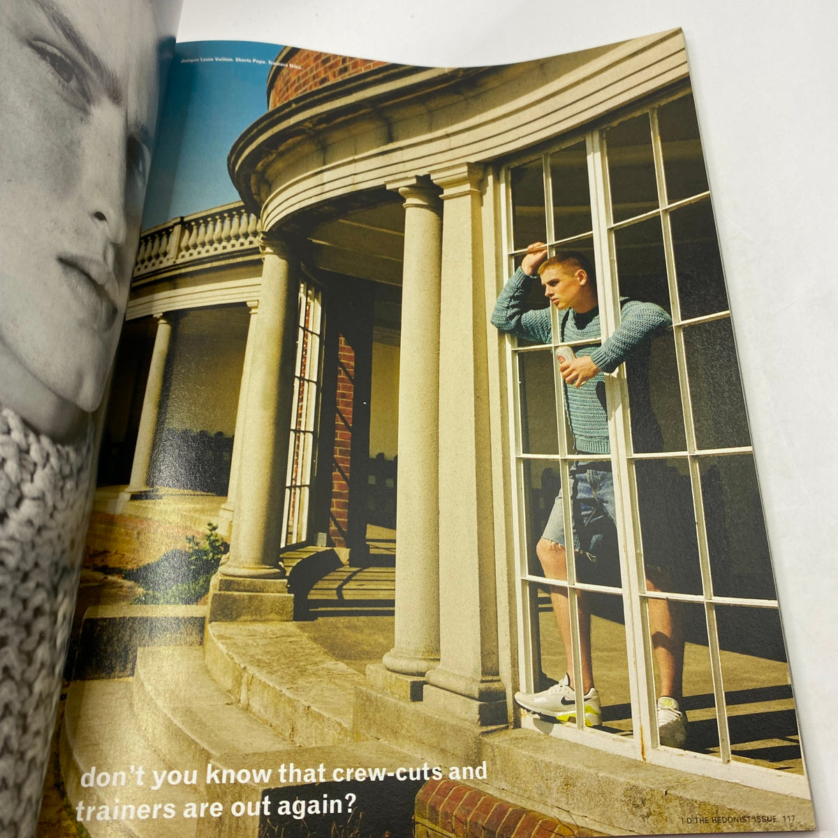 Page from i-D Magazine Summer 2011 No. 313 featuring an outdoor fashion shot of a model in a stylish crew-cut and trainers, reflecting early 2010s fashion trends.