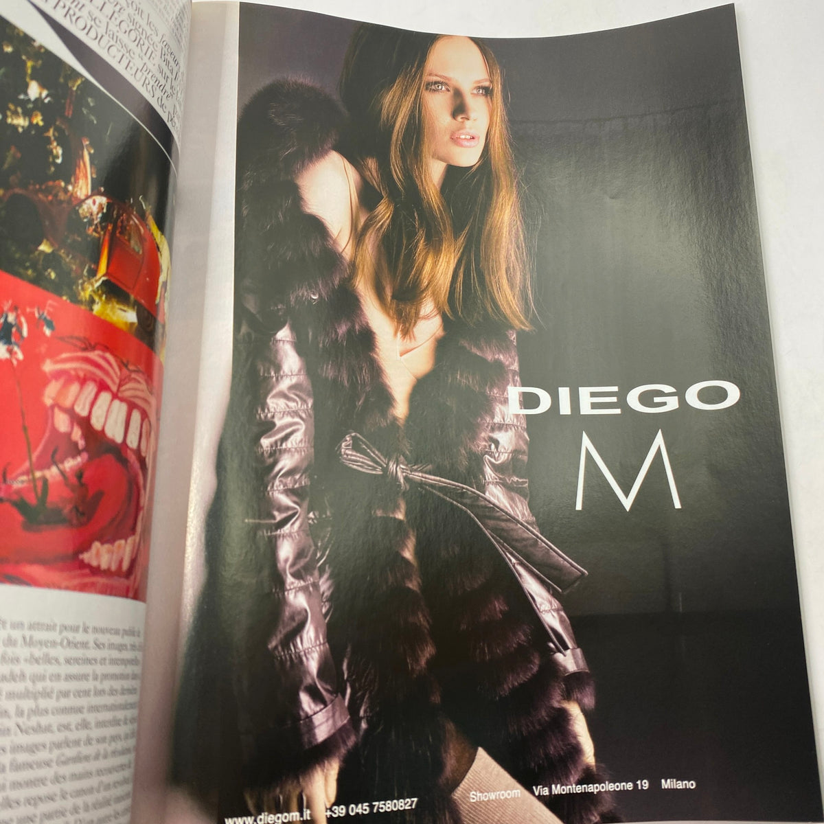 Fashion editorial page from Vogue Paris Magazine August 2008 featuring a model in a luxurious fur coat promoting DIEGO M fashion brand.