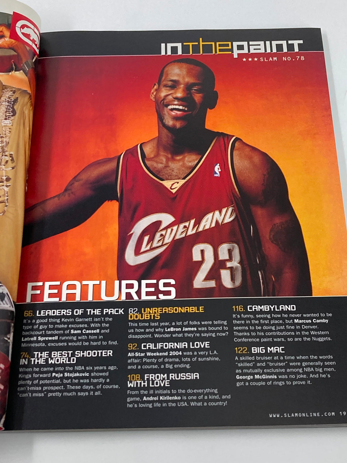 Features page from Slam Magazine May 2004 with LeBron James wearing a Cleveland Cavaliers jersey, celebrating his early career highlights.