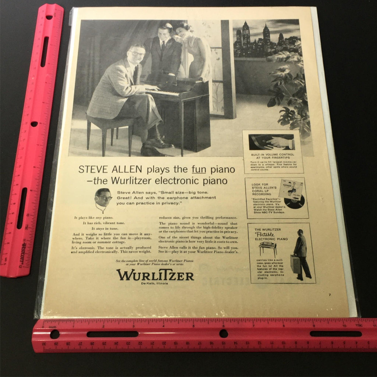 Vintage Wurlitzer print ad with Steve Allen playing the 'Sweet Lorraine' piano, displayed with a ruler for size reference, emphasizing its collectible nature.