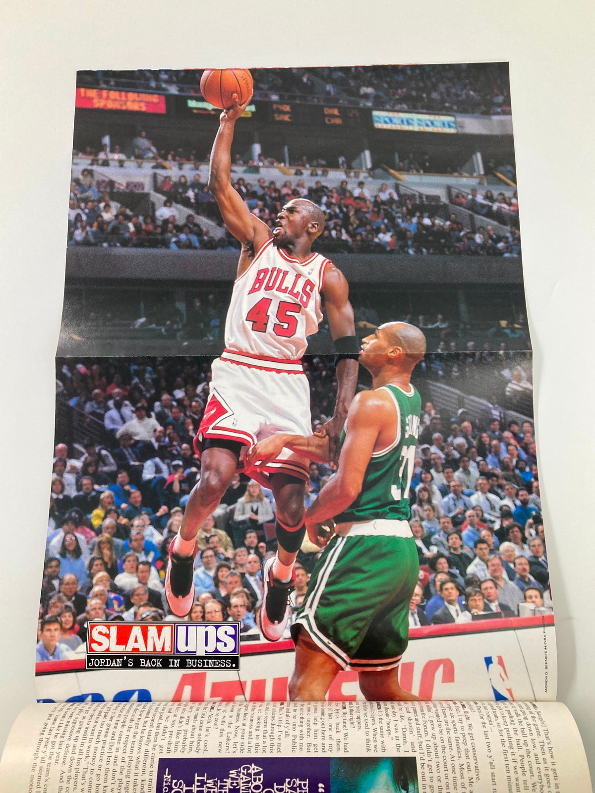 Exclusive pull-out poster from Slam Magazine July 1995, highlighting Michael Jordan making a remarkable slam dunk during an NBA game.