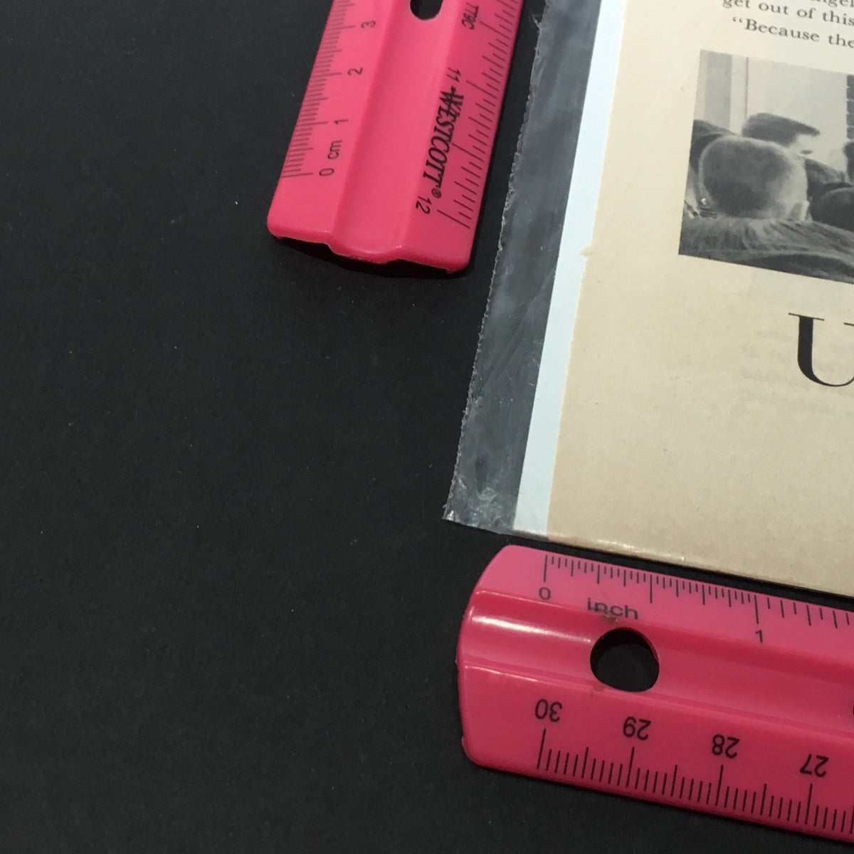 Close-up detail of the VTG 1976 Royal Triton Union Oil Company of California Sports Club Print Ad, highlighting the protective covering and measurement tools.