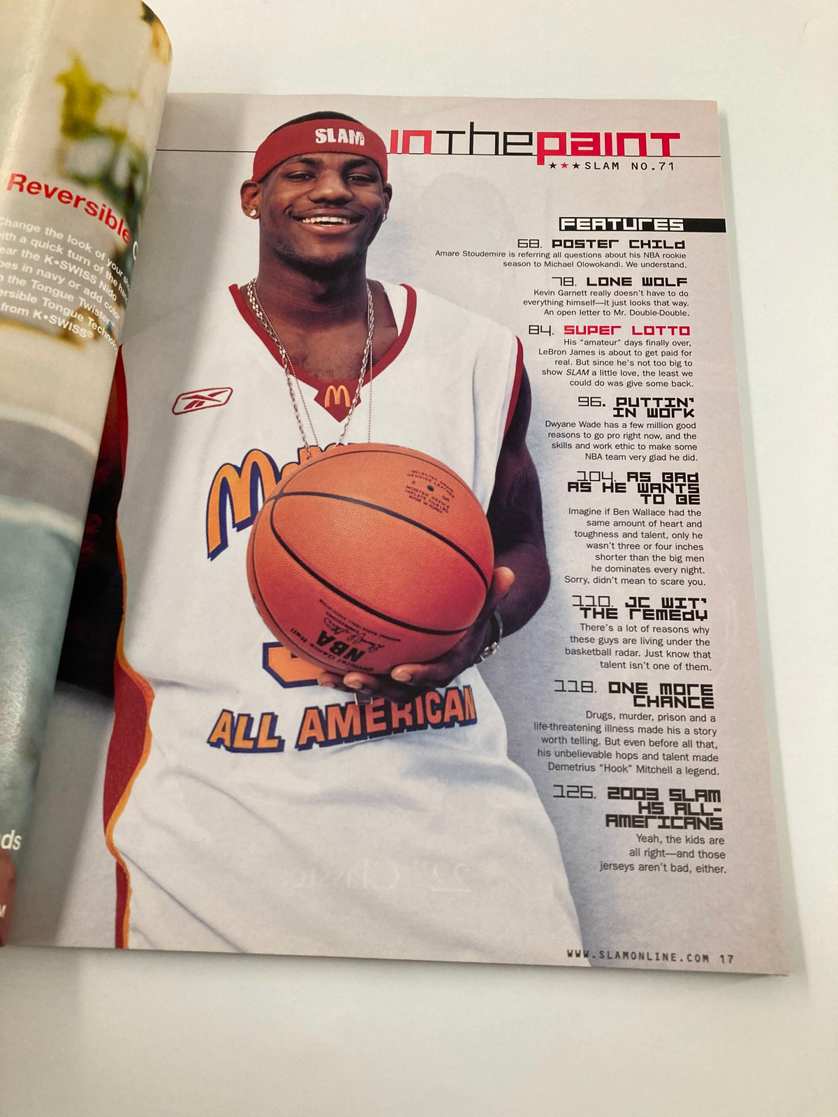 Slam Magazine August 2003 featuring LeBron James, showcasing an image of a smiling LeBron wearing a McDonald's All-American jersey, holding a basketball.
