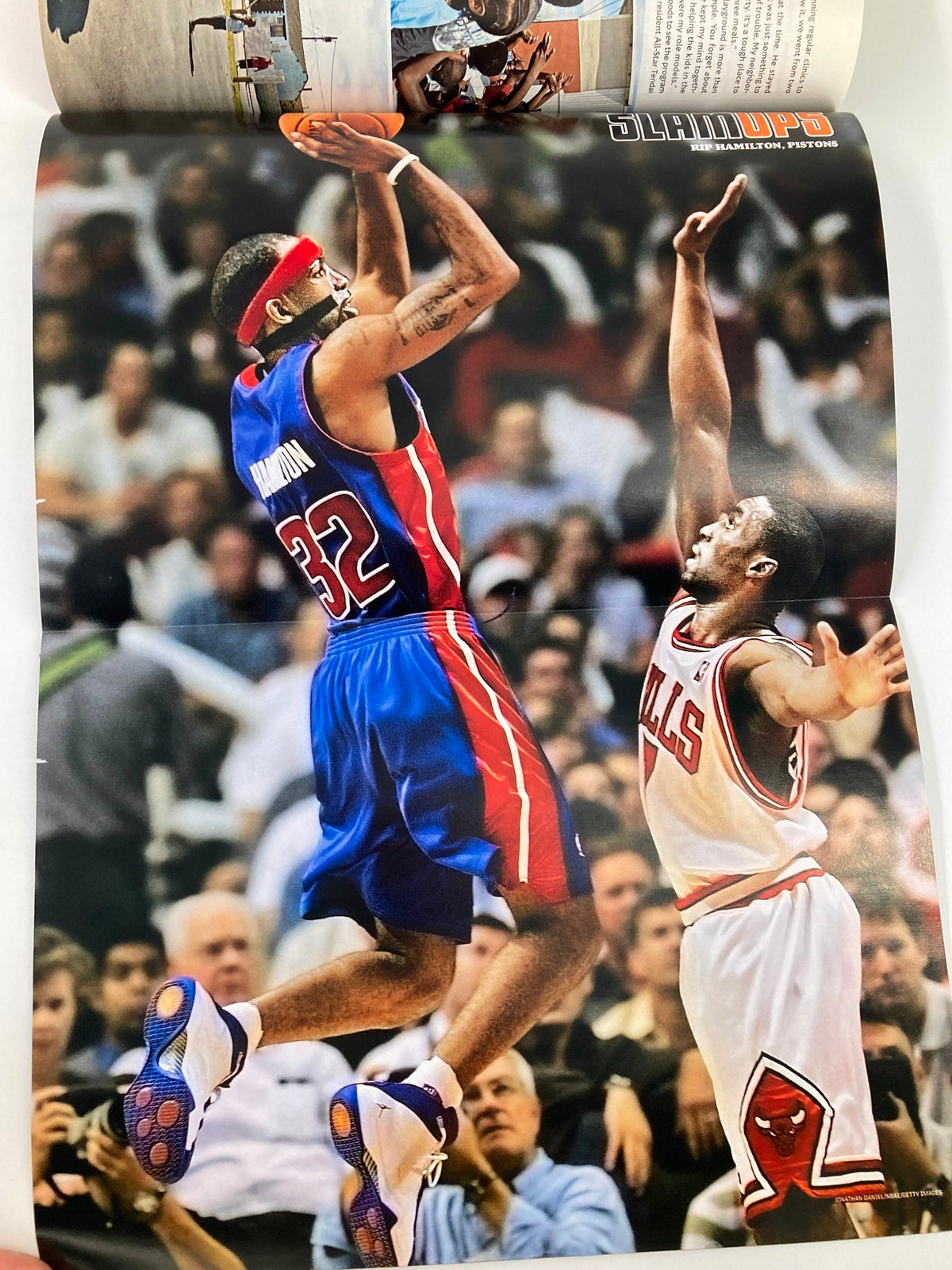 Fold-out poster from Slam Magazine August 2007 featuring a dynamic shot of a basketball player in action, showcasing the intensity of the NBA.