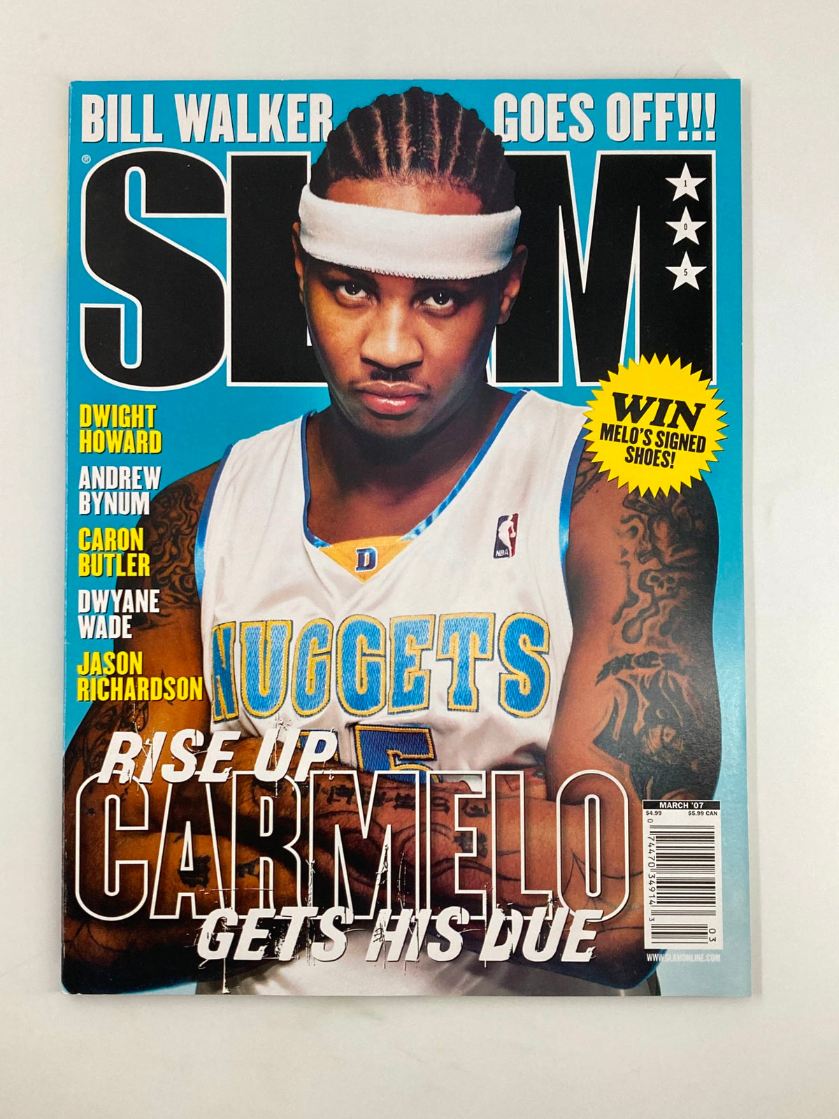 Cover of Slam Magazine March 2007 featuring NBA Nuggets star Carmelo Anthony, highlighting his rise in basketball with the title 'Rise Up, Carmelo Gets His Due'. Includes promotional text about winning signed merchandise.