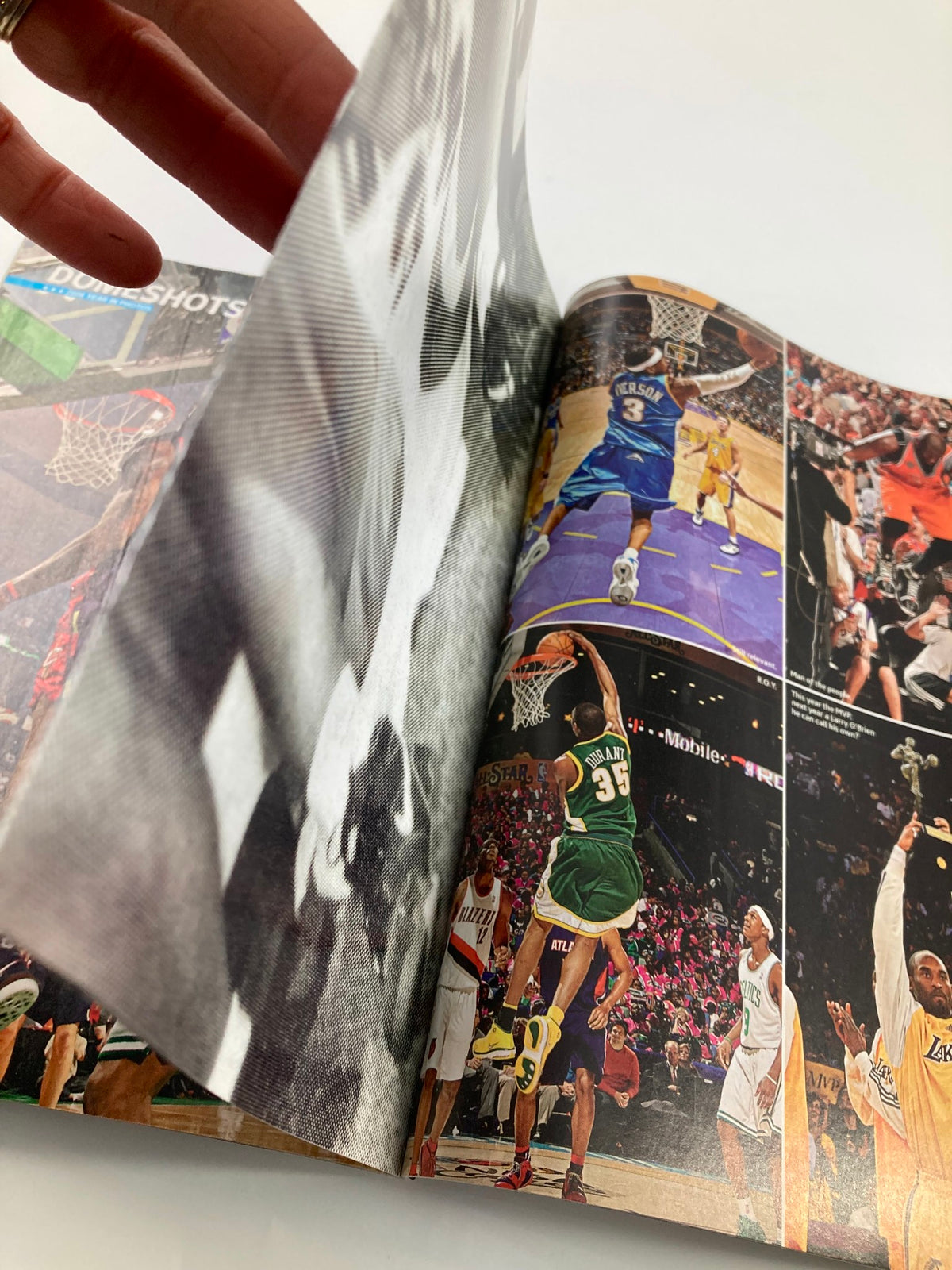 Inside view of Slam Magazine September 2008 featuring NBA highlights including Paul Pierce and Boston Celtics moments, showcasing dynamic images from the basketball season.