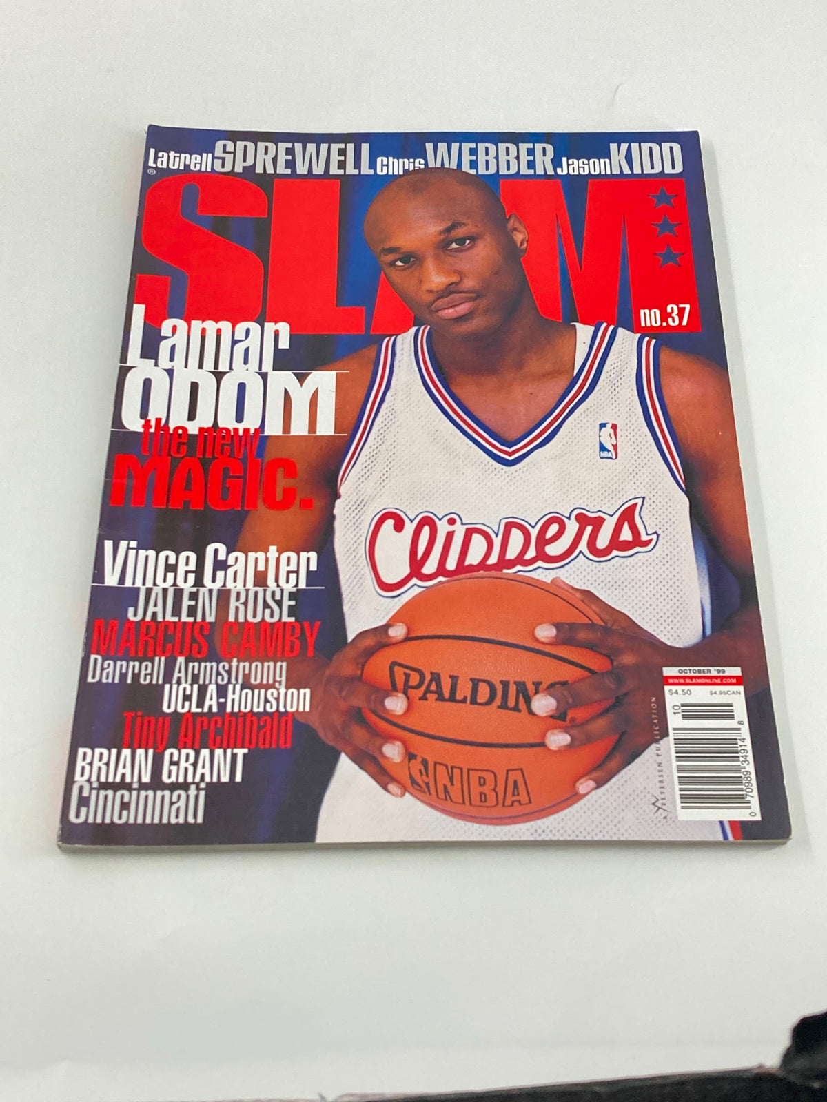 Cover of Slam Magazine October 1999 featuring Lamar Odom of the Los Angeles Clippers, showcasing the title 'the new MAGIC' with a basketball in hand.
