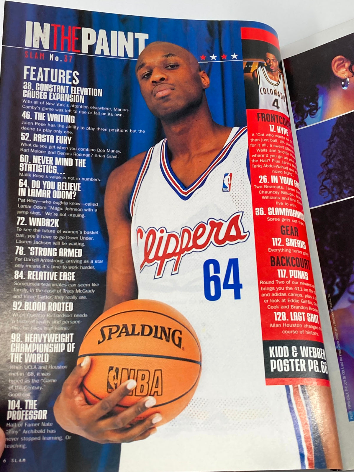 Inside page of Slam Magazine October 1999 featuring a tall image of Lamar Odom, highlighting features and topics relevant to that issue.
