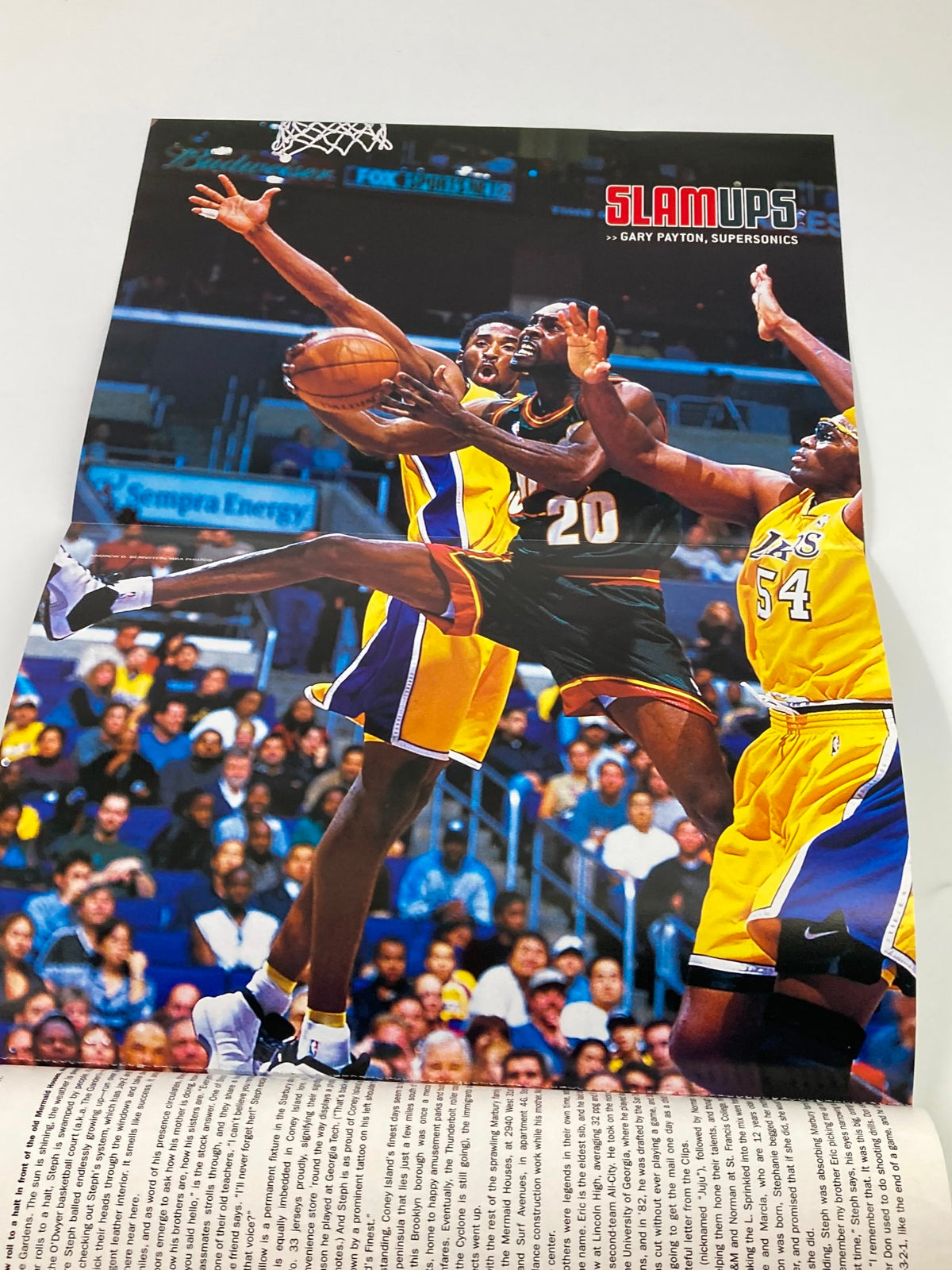 Slam Magazine February 2001 featuring NBA action, showcasing Brooklyn Nets star Stephon Marbury on the cover alongside a dynamic basketball play.