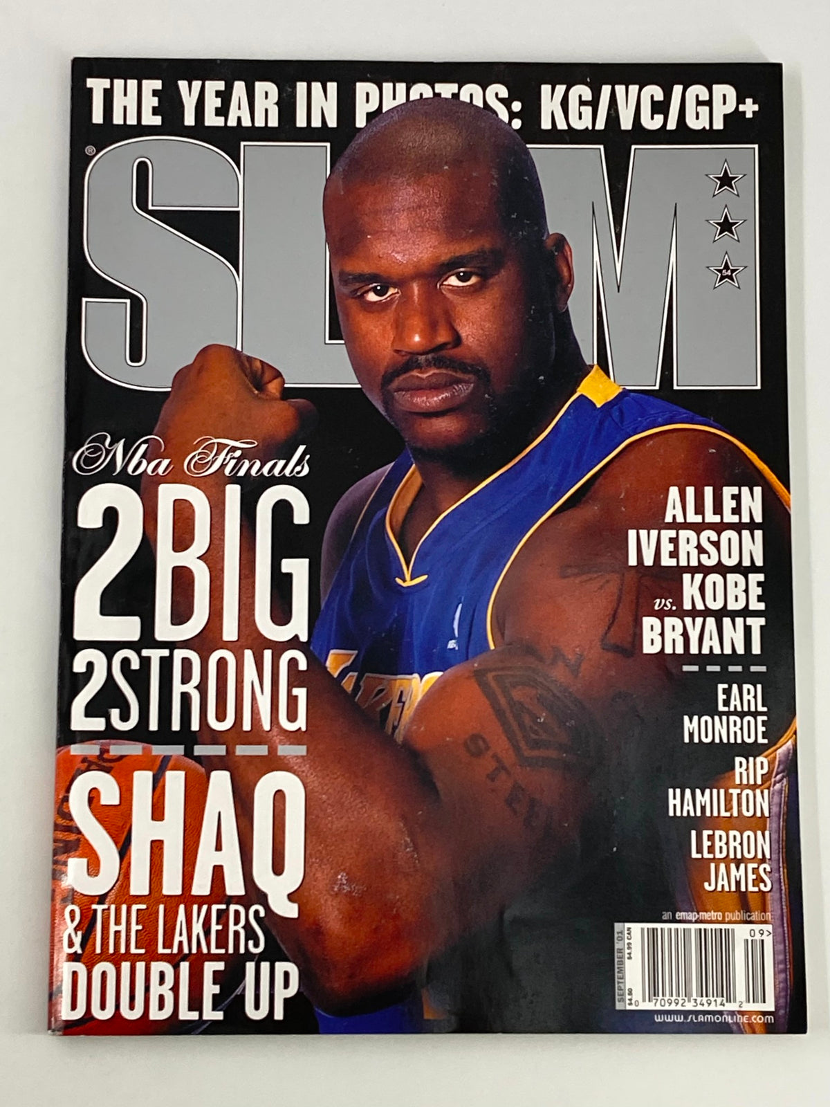 Cover of Slam Magazine September 2001 featuring Shaquille O'Neal, highlighting his prominence in NBA Finals alongside other players, surrounded by articles on basketball.