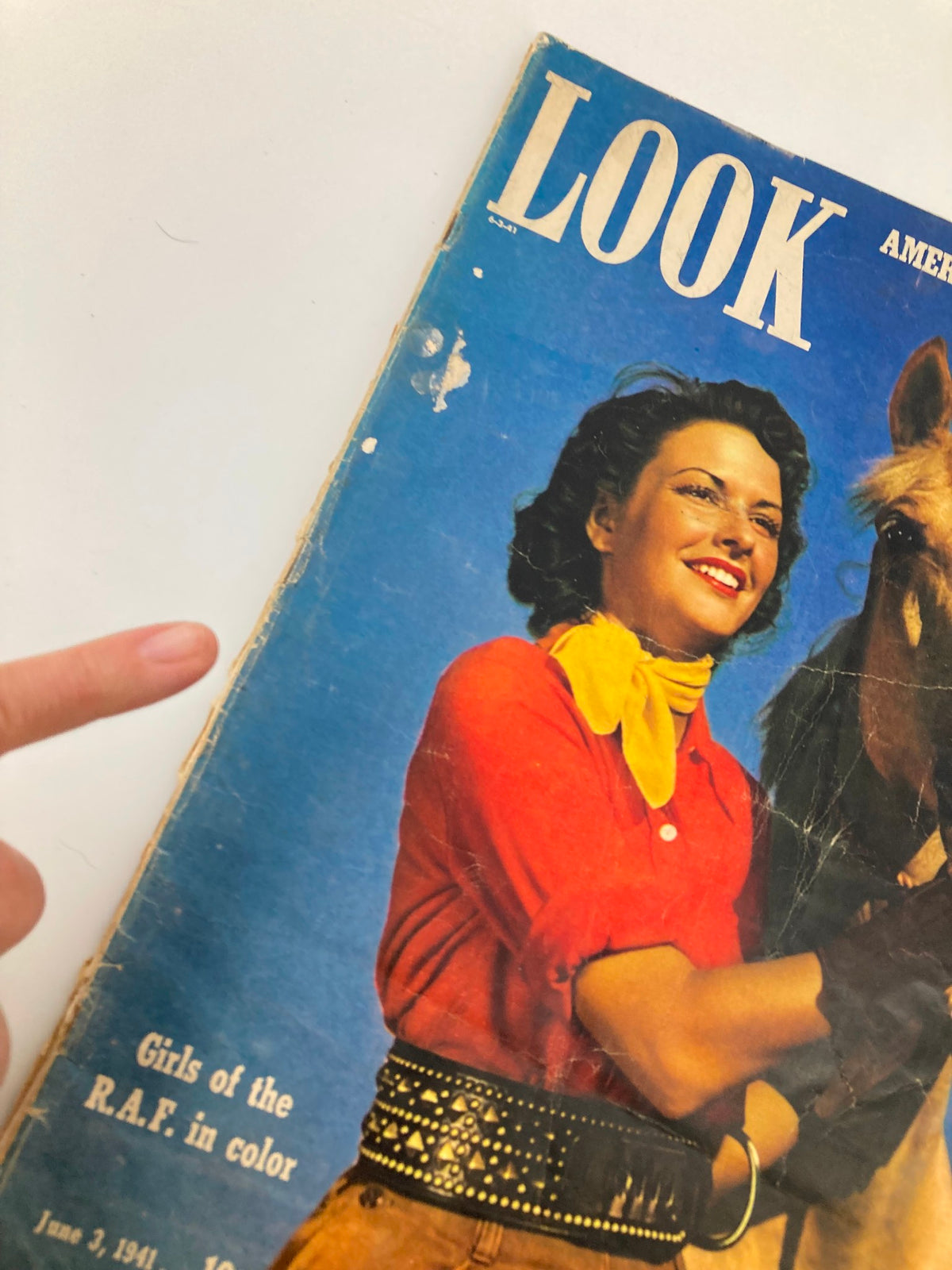 Close-up of the VTG Look Magazine June 3 1941 cover, highlighting a smiling woman in a red shirt and yellow scarf, with a horse, emphasizing the article on the Girls of the RAF.