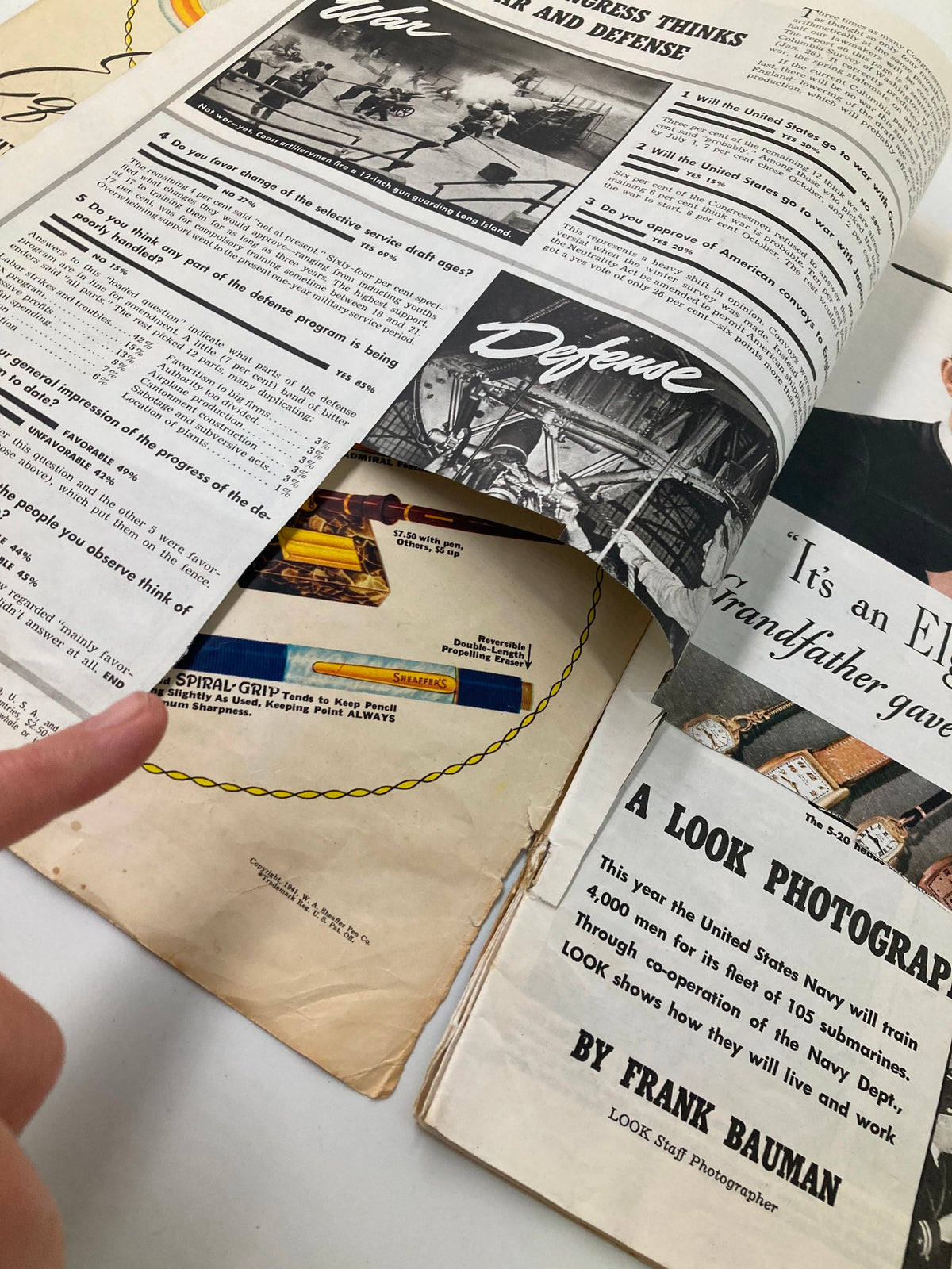 Interior view of the vintage Look Magazine June 3 1941 featuring military and defense survey questions, highlighting WWII themes.