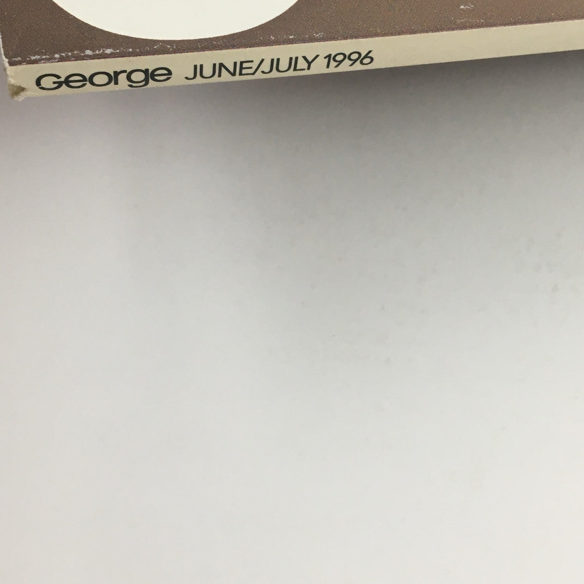 Cover corner of George Magazine June 1996 featuring the title and publication date, emphasizing the cultural significance of sex and politics in the 90s.