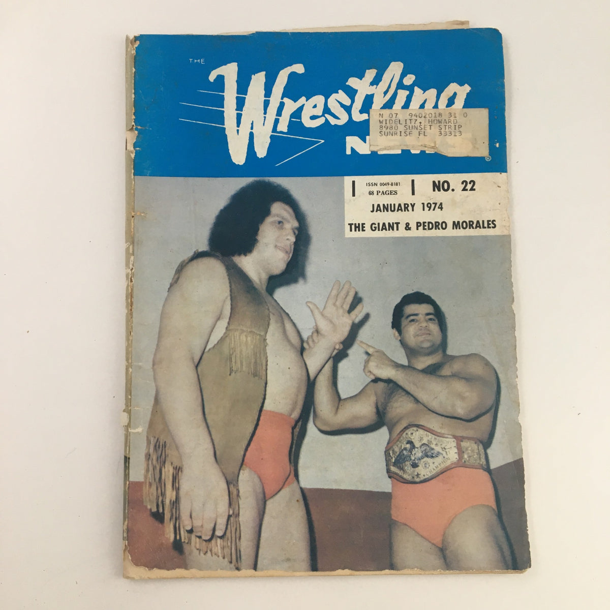 Wrestling News Magazine January 1974 featuring Andre the Giant & Pedro Morales on the cover. This vintage magazine captures iconic moments in wrestling history.