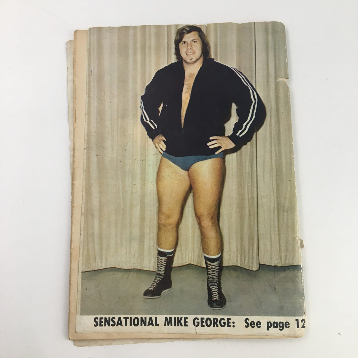 Cover of Wrestling News Magazine January 1974 featuring Sensational Mike George, highlighting his profile and a promotional mention.
