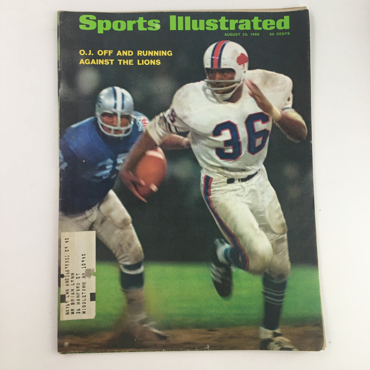 Cover of Sports Illustrated Magazine from August 25, 1969 featuring O.J. Simpson in action, showcasing him running against a defender, symbolizing competitive spirit in sports.