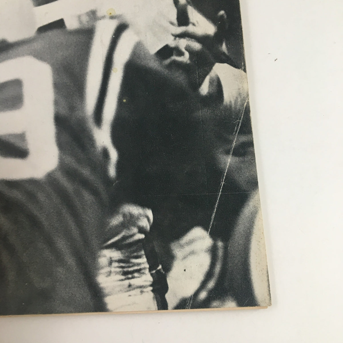 Close-up view of Sports Illustrated Magazine cover from January 4, 1965 showcasing Cleveland Quarterback Frank Ryan with the text about the Baltimore defense.