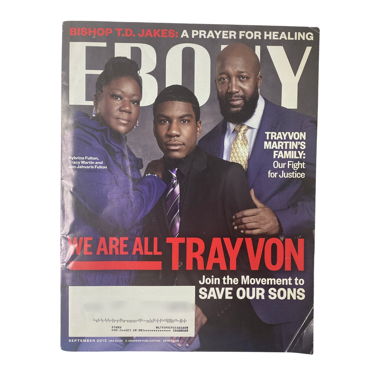 Ebony Magazine September 2013 cover featuring Sybrina Fulton, Tracy Martin, and Jahvaris Fulton. The headline reads 'WE ARE ALL TRAYVON' highlighting the Trayvon Martin family's fight for justice and community action to save Black youth.